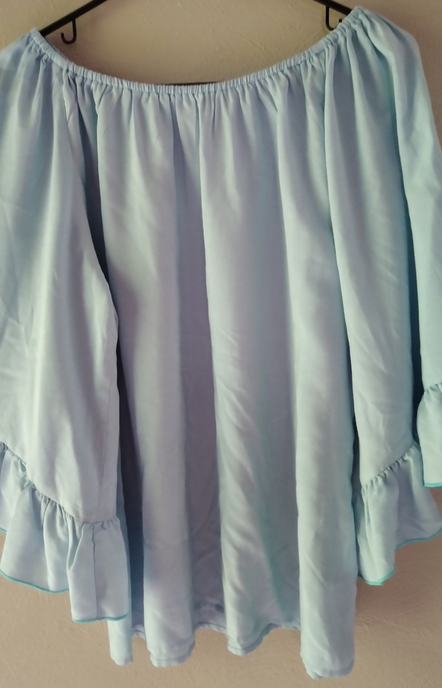 Off the shoulder peasant top. This is a baby blue